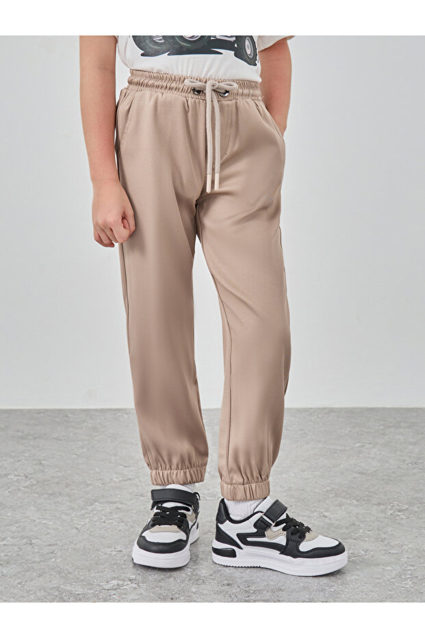 بنطال رياضي سادة متوسط ​​الارتفاع مع رباط - 1