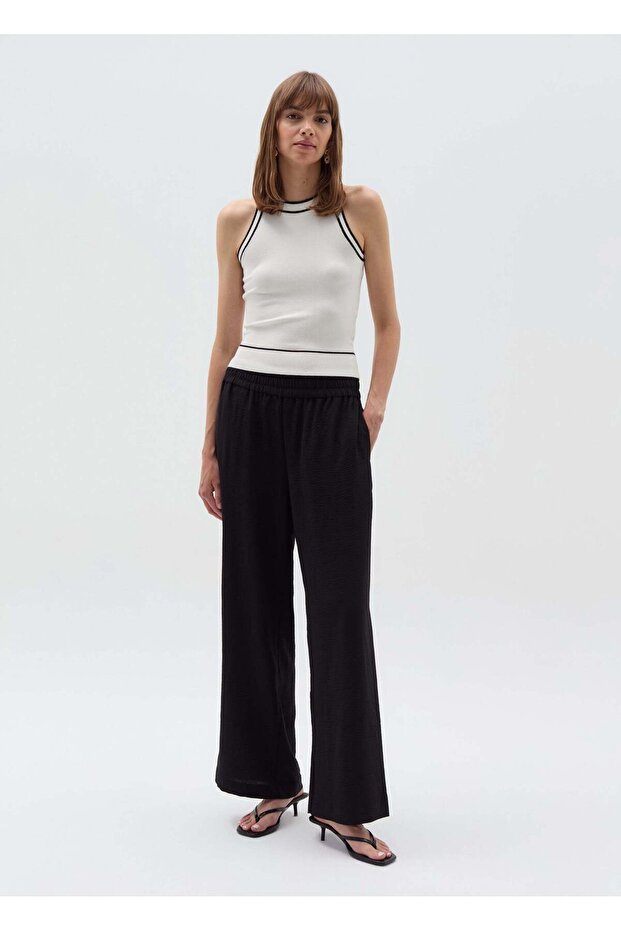 بنطلون سائل بتأثير مجعد - 1