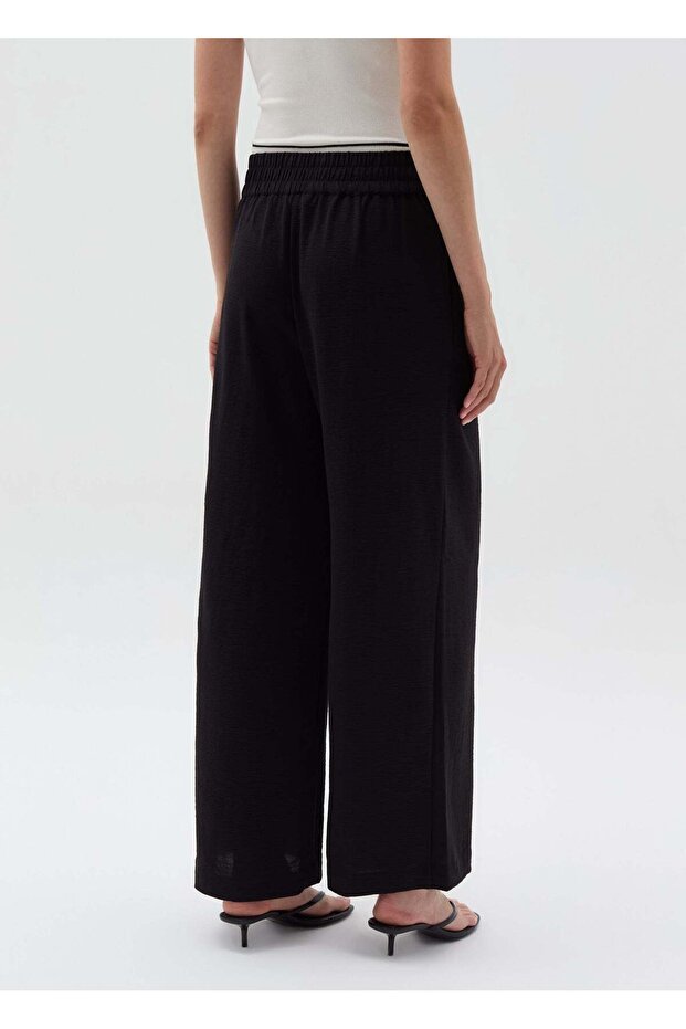 بنطلون سائل بتأثير مجعد - 3