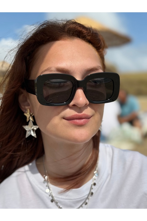 نظارات شمسية نسائية مستقطبة بإطار مستطيل أسود وزجاج أسود