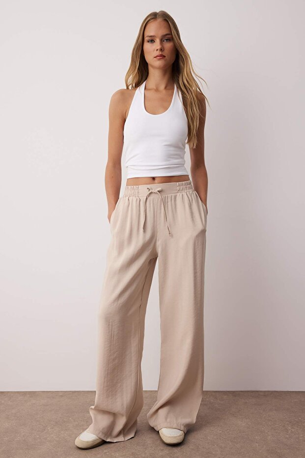 Bej Modal Tuşeli Beli Lastikli Wide Leg/Geniş Paça Pantolon TWOSS25PL00130 - 1