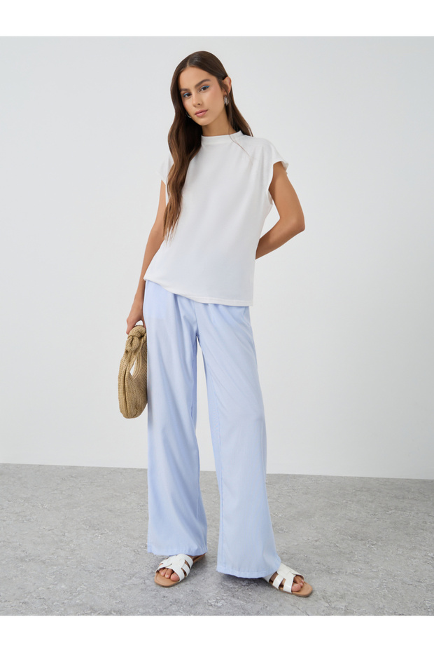 تي شيرت سادة بدون أكمام بقصّة عادية - 2