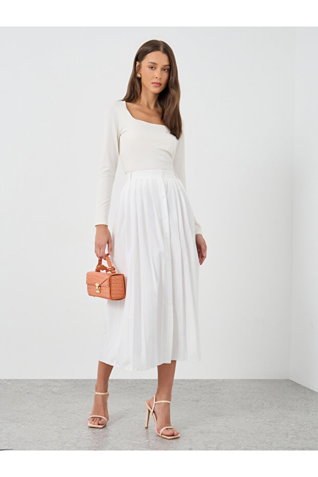 تنورة ميدي سادة مطوية على شكل حرف A مع أزرار أمامية - 1