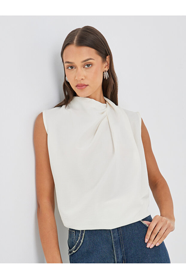 Solid Asymmetric Neck Sleeveless Top - 1