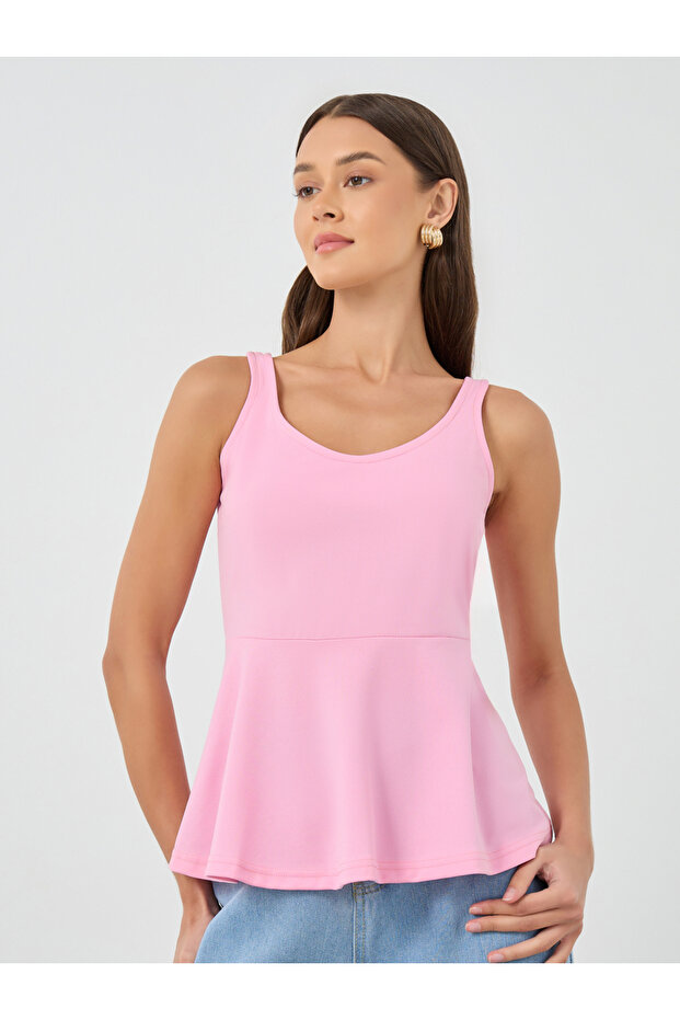 بلوزة بيبلوم سادة بدون أكمام - 1