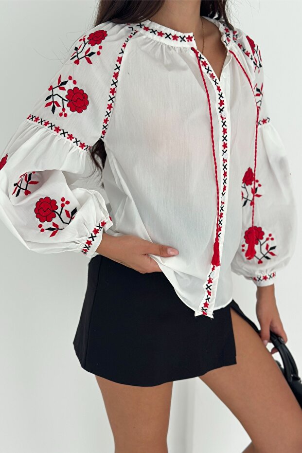 Women's White Cotton Blouse with Ethnic Pattern, Floral Embroidery, and Tasseled Details