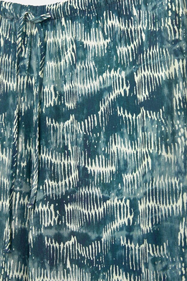 Desenli dökümlü pantolon - 7