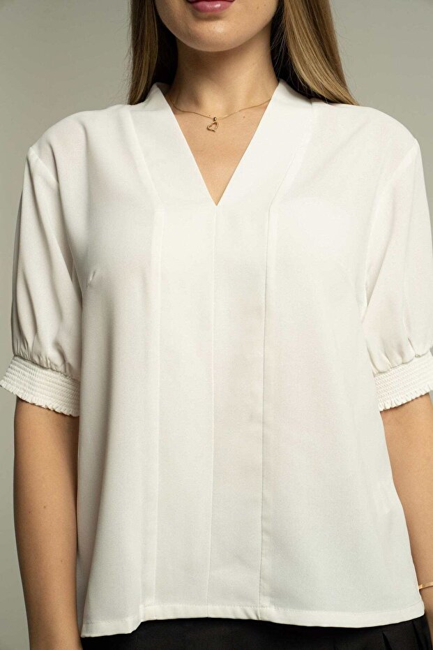 بلوزة سادة بأكمام قصيرة وأساور - 1