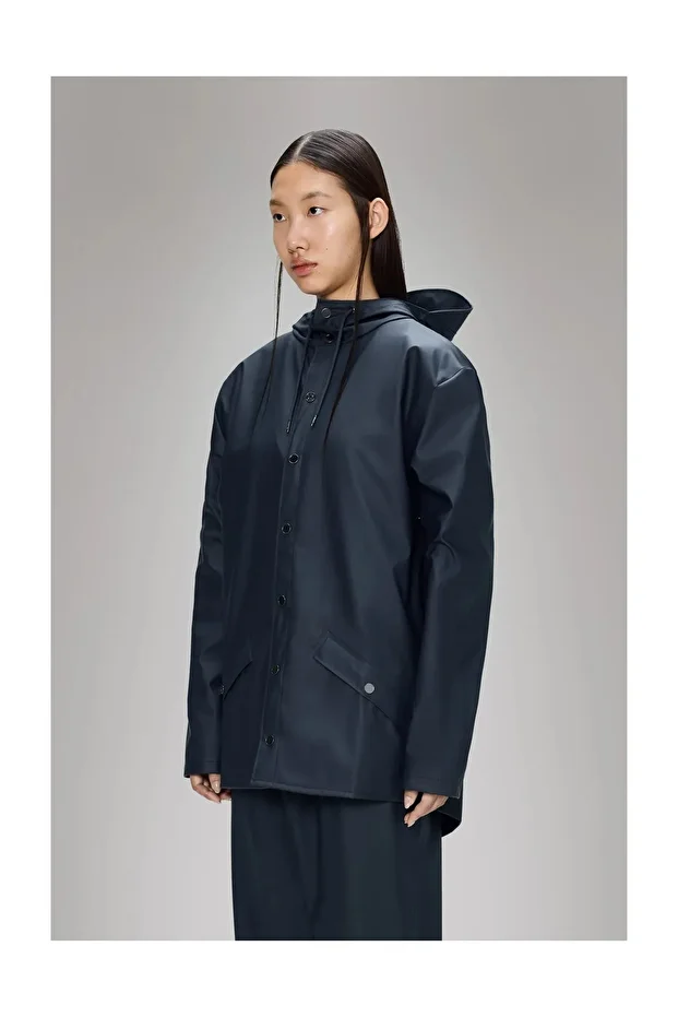 Waterproof jacket is cut from Rains’ signature PU fabric and features ultrasonically welded seams. - 2