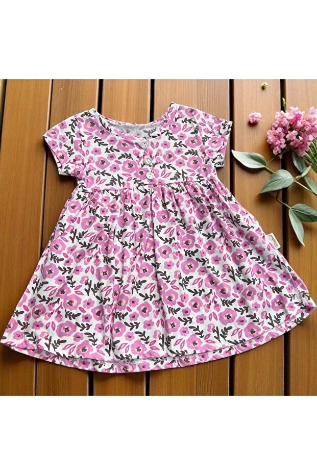 فستان زهري بأزرار باللون الوردي - 1