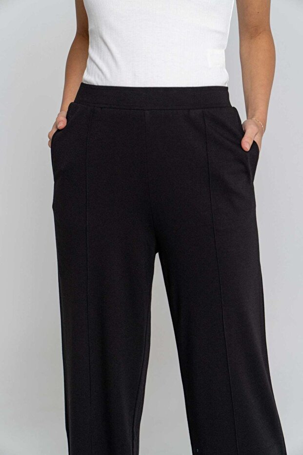 بنطال طويل سادة مع جيوب أمامية - 1