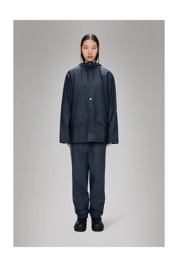 Waterproof jacket is cut from Rains’ signature PU fabric and features ultrasonically welded seams. - 1