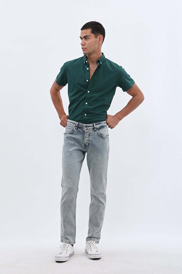بنطال جينز بقصّة Slim Fit - أزرق فاتح مغسول