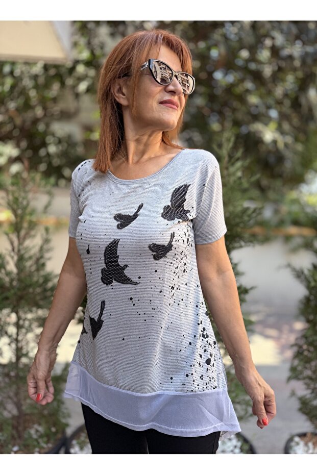 بلوزة بنمط الطيور السوداء بالنعناع - 1