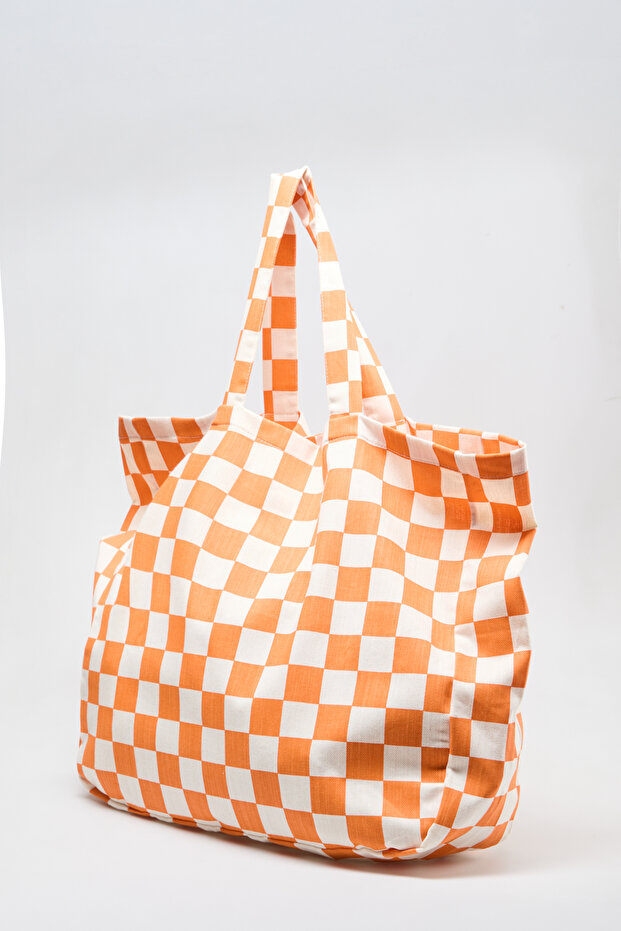 حقيبة قماش كبيرة الحجم منقوشة باللون البرتقالي