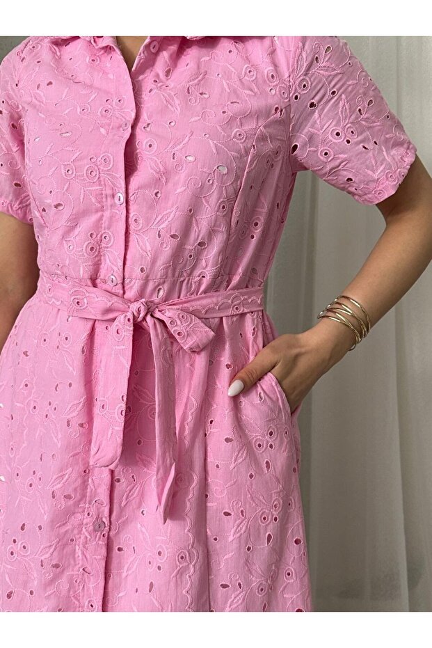 Belted, beaded design, maxi-length wrap dress, comfortable and stylish for everyday wear.