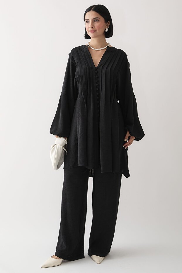 بدلة أيروبين سوداء برباط وأكمام مضلعة - 2