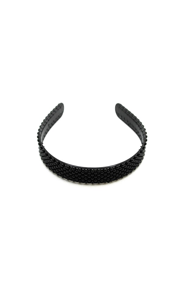 تاج في نماذج منقوشة من البلاستيك - 1