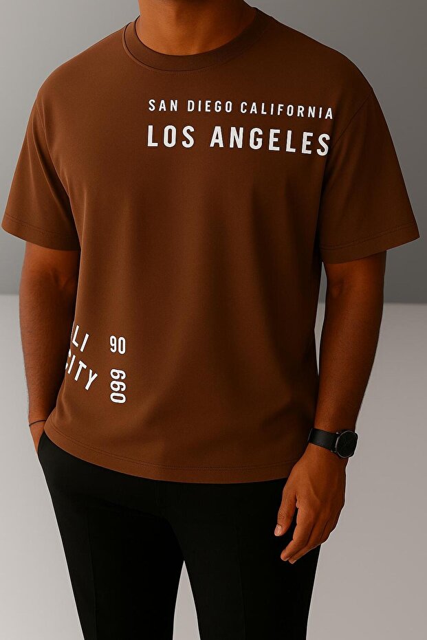 تي شيرت أوفر سايز للجنسين بطبعة LOS ANGELES