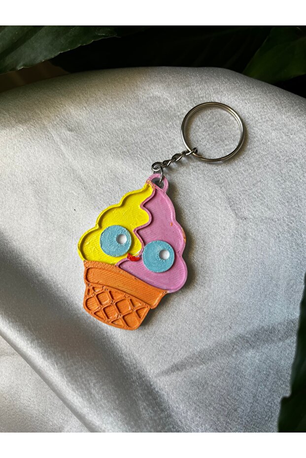 سلسلة مفاتيح على شكل كب كيك بألوان قوس قزح ثلاثية الأبعاد - 1