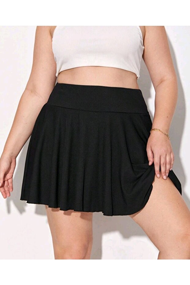 تنورة سوداء كبيرة الحجم ذات قصة واسعة قليلاً - 2