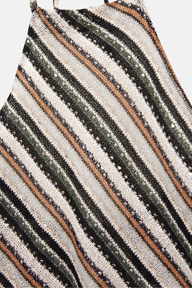 بلوزة مخططة بدون أكمام - 7