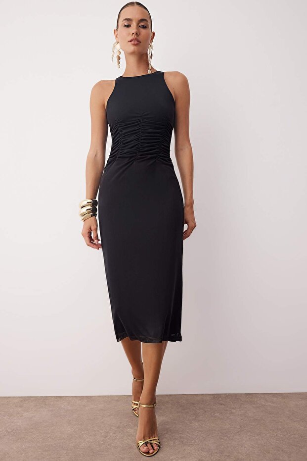 Czarna suknia z kwiatowym wzorem, z dzianinowej tkaniny, z podszewką, do matury/balu TPRSS24EL00202 - 1