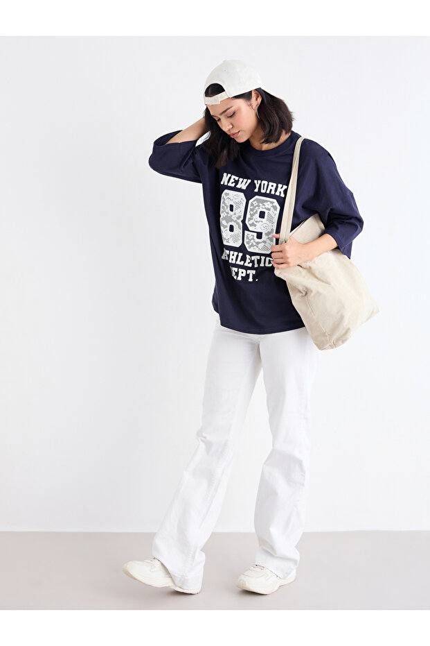 Women Navy Graphic Oversized T-Shirt with Dropped Shoulder