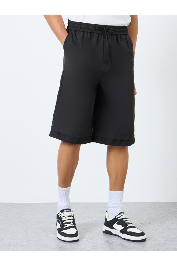شورت رجالي أسود سادة كبير الحجم برباط - 1