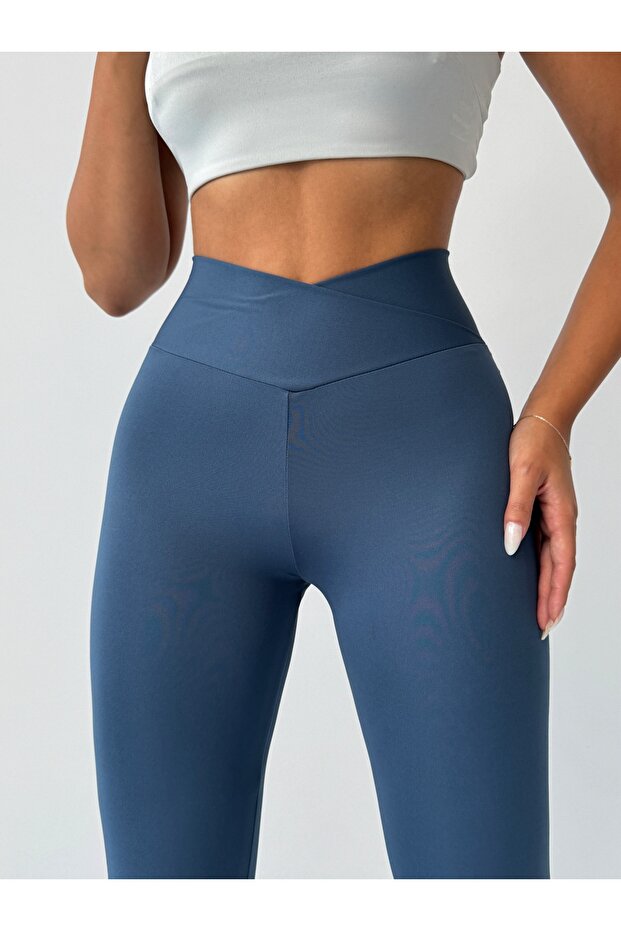 Magas derekú, karcsúsító leggings keresztirányú övvel, indigókék színben - 1