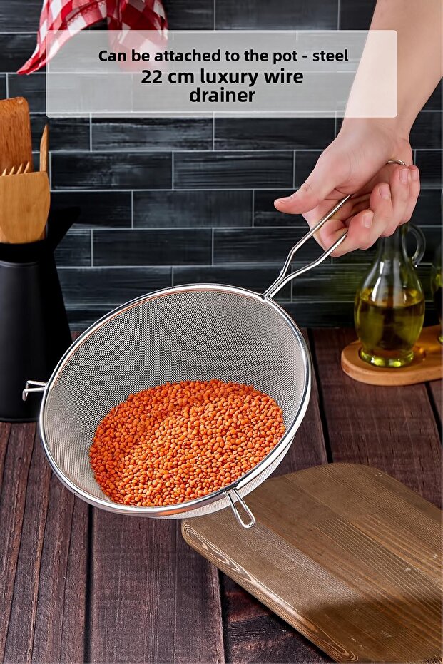 22 cm Luxury Medium Size Steel Wire Strainer and Colander Attached to the Pot