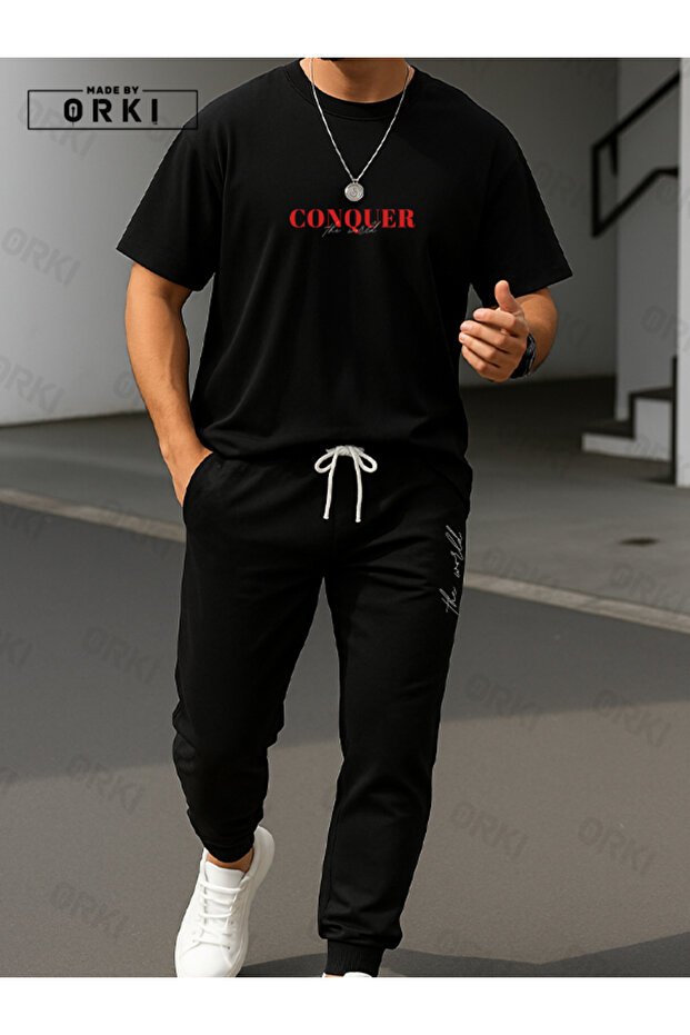 تي شيرت أسود كبير الحجم مطبوع عليه Conquer the World مع طقم بنطلون رياضي أسود