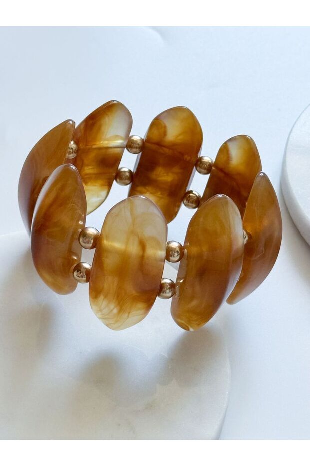 سوار مطاطي من العظم - 1