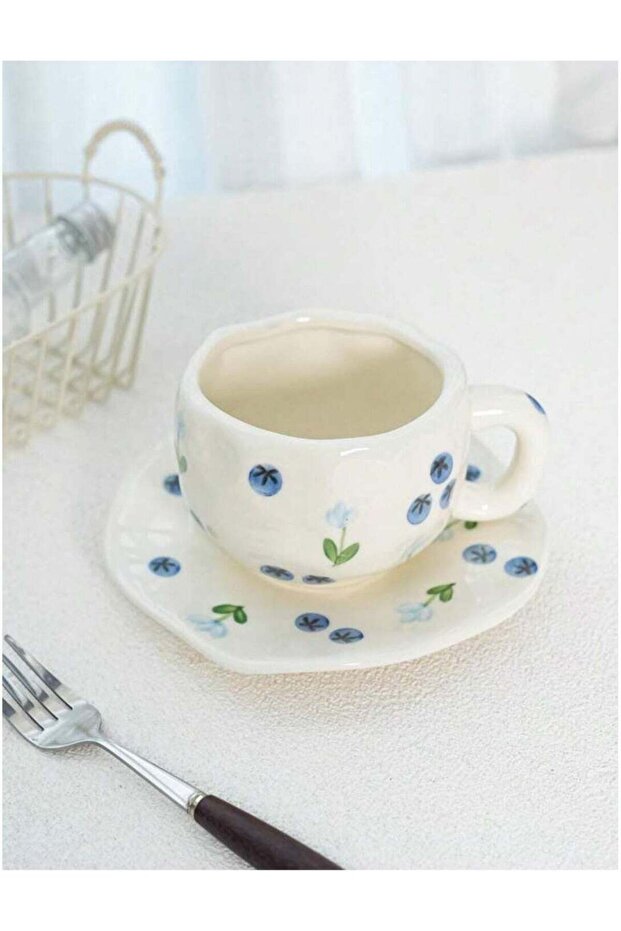 فنجان قهوة مع صحن - 1