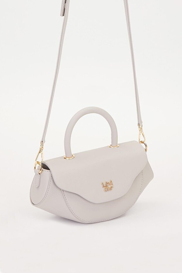 A. حقيبة كتف موديل هندسي باللون الرمادي - 2