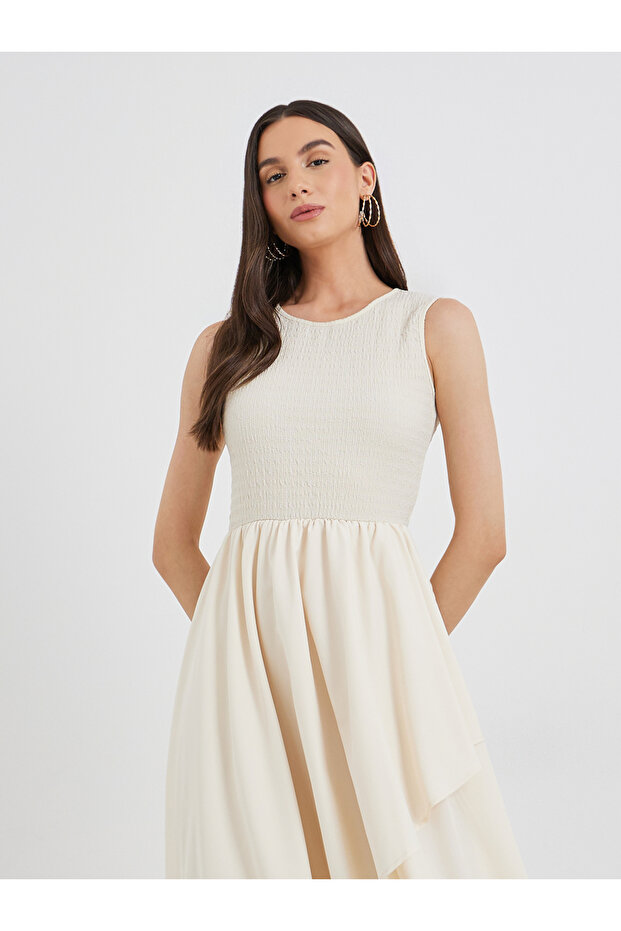 فستان ميدي سادة بدون أكمام وحافة غير منتظمة - 2