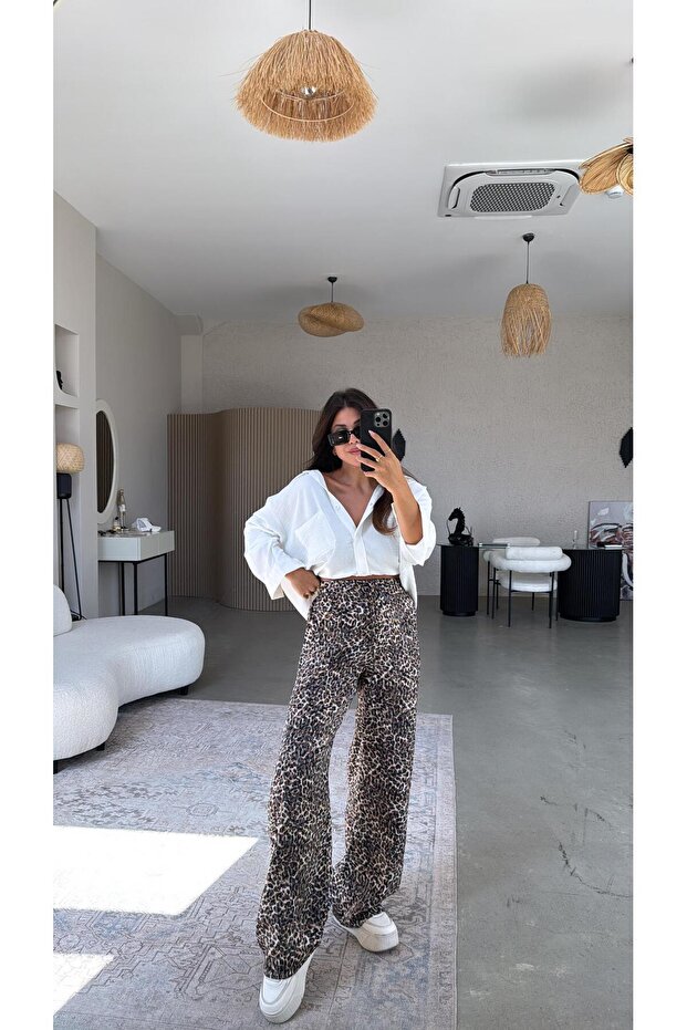 بنطلون من الساتان الحريري بتصميم نمط الفهد - 3