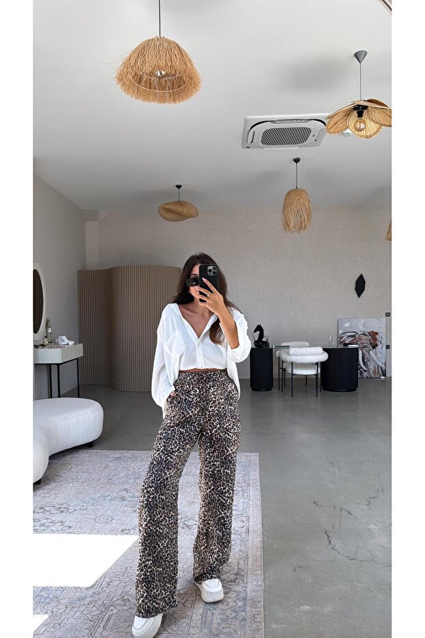 بنطلون من الساتان الحريري بتصميم نمط الفهد - 5