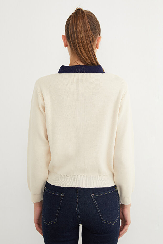 سترة تريكو أساسية بياقة بولو ونصف زر - 6