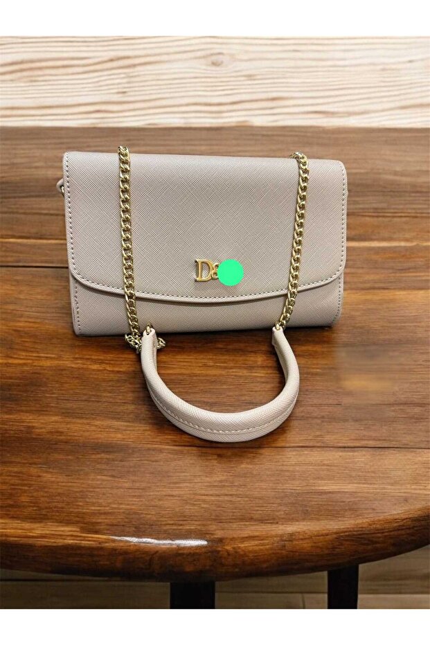 Shoulder bag, an exact copy of the famous brand. It comes with a box, a bag, and a warranty card with the same brand name. - 1