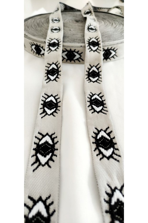 Eye Patterned Narrow Woven Strip