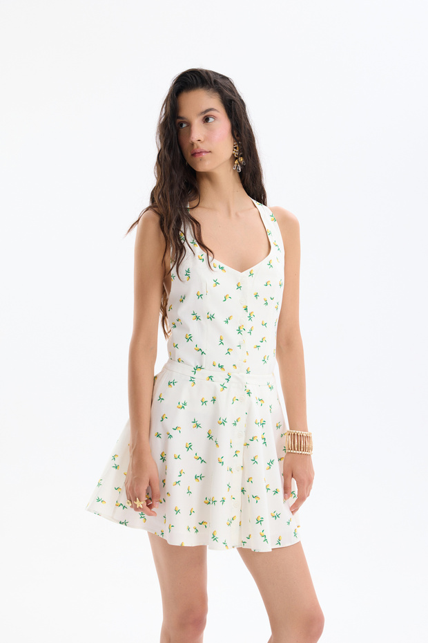 تنورة قصيرة منقوشة بالليمون إكرو - 3