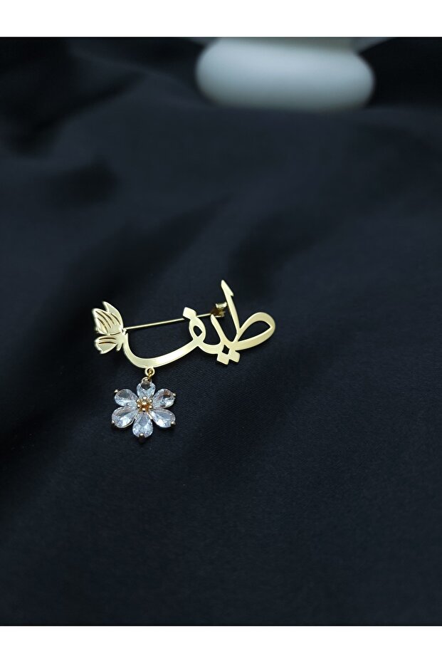 My daughters' brooch with the name Taif