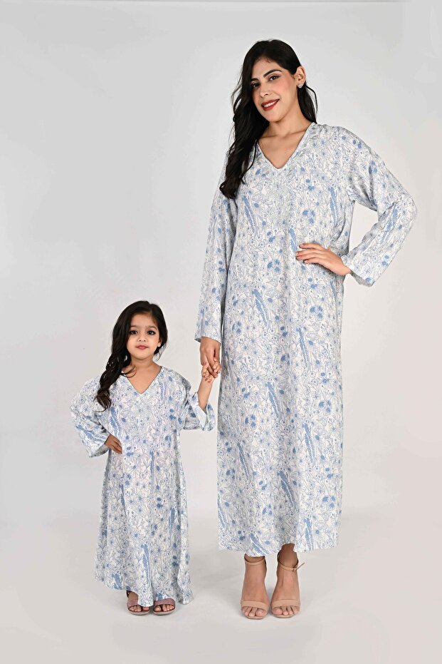 Kids Jalabiya – White Base with Blue Florals and Embroidered Neckline