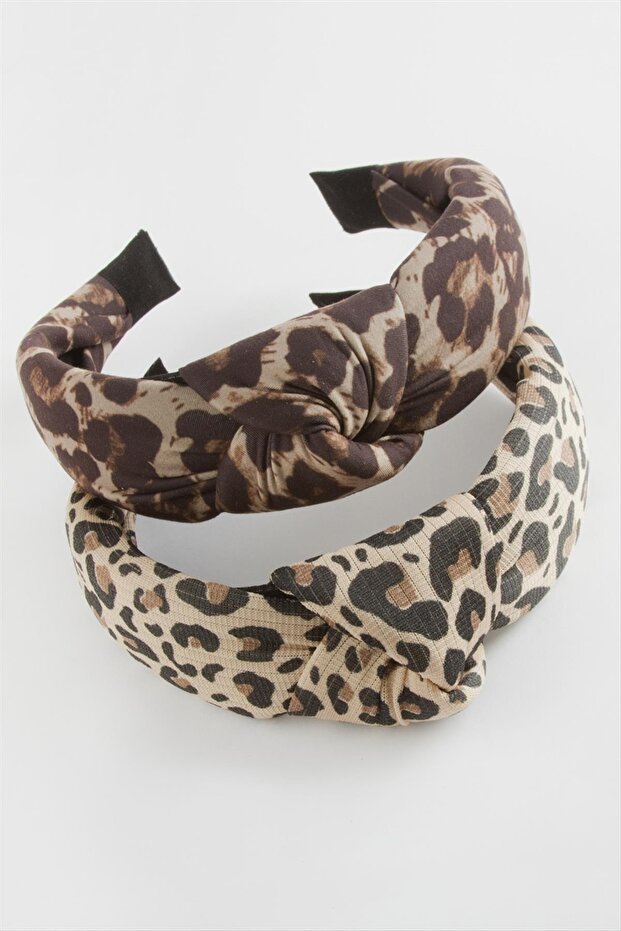 تاج على شكل فيونكة بنقشة الفهد - 1