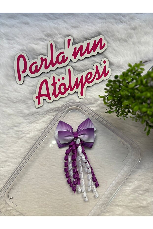Bow-shaped hairpin with fringe and alligator clip