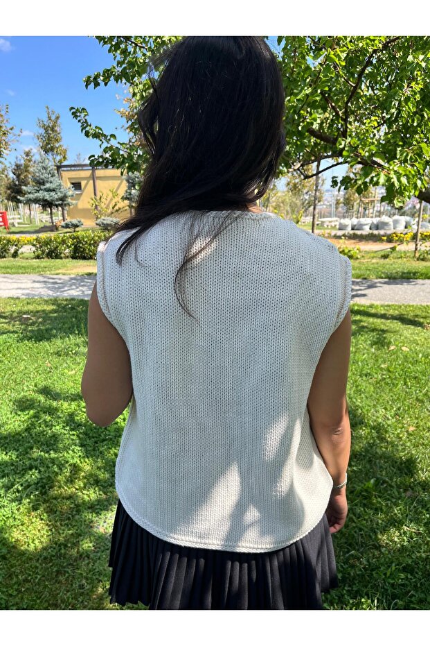 سترة تريكو بأزرار كبيرة - 5