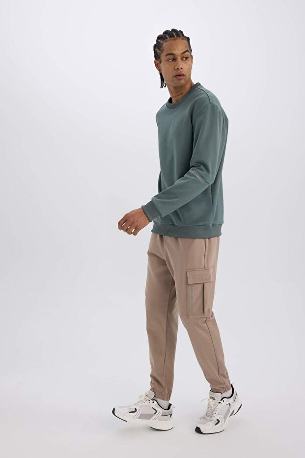 DeFactoFit Sporcu Jogger Eşofman Altı Standart Fit Üç Cepli Beli Bağcıklı Lastikli Paça D3741AX24WN - 1