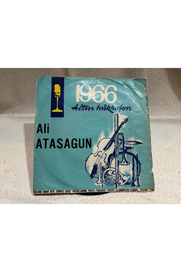 ألي أتاسوي - ميكروفون ذهبي 1966 - إيمينيم - نصف - تسجيل سبعة نقاط