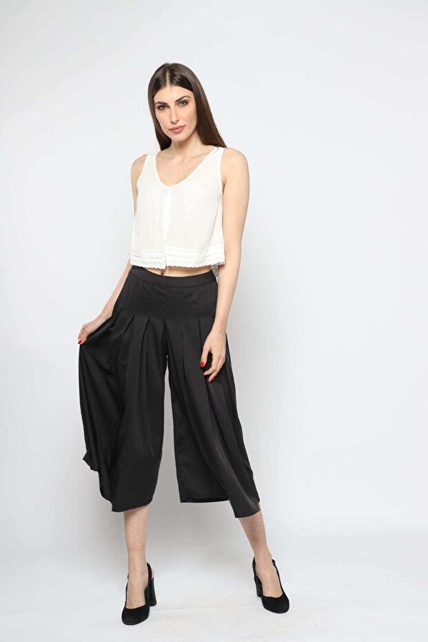 بنطلون واسع مقصوص سادة - 1